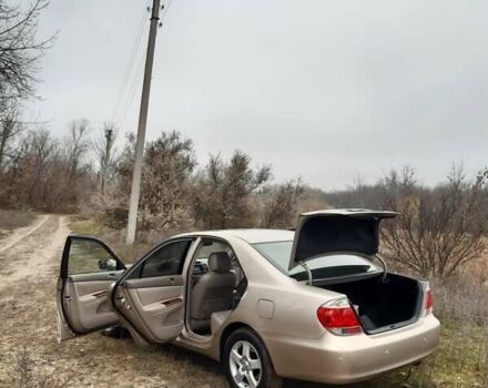 Бежевий Тойота Камрі, об'ємом двигуна 2.4 л та пробігом 299 тис. км за 6400 $, фото 29 на Automoto.ua