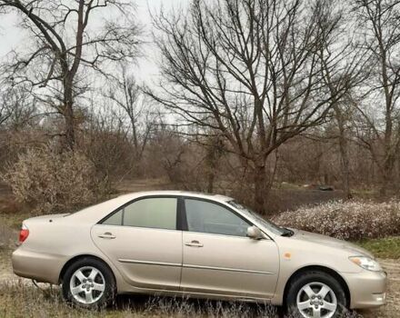 Бежевий Тойота Камрі, об'ємом двигуна 2.4 л та пробігом 299 тис. км за 6400 $, фото 12 на Automoto.ua