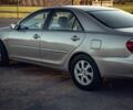 Бежевий Тойота Камрі, об'ємом двигуна 3 л та пробігом 212 тис. км за 5900 $, фото 4 на Automoto.ua