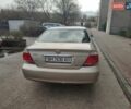 Бежевий Тойота Камрі, об'ємом двигуна 2.36 л та пробігом 300 тис. км за 5303 $, фото 2 на Automoto.ua