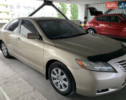 Бежевый Тойота Камри, объемом двигателя 3.5 л и пробегом 245 тыс. км за 10300 $, фото 1 на Automoto.ua