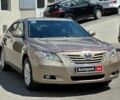 Бежевий Тойота Камрі, об'ємом двигуна 2.4 л та пробігом 325 тис. км за 9890 $, фото 2 на Automoto.ua