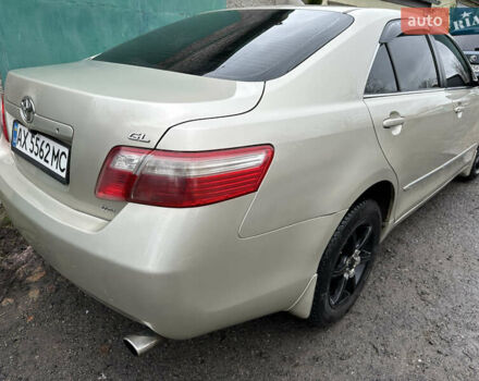 Бежевий Тойота Камрі, об'ємом двигуна 2.4 л та пробігом 230 тис. км за 7700 $, фото 1 на Automoto.ua