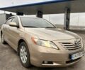 Бежевый Тойота Камри, объемом двигателя 2.4 л и пробегом 230 тыс. км за 5700 $, фото 1 на Automoto.ua