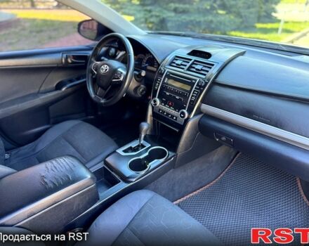 Бежевый Тойота Камри, объемом двигателя 2.5 л и пробегом 243 тыс. км за 12800 $, фото 5 на Automoto.ua