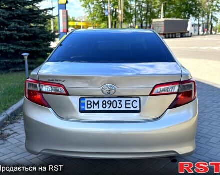 Бежевый Тойота Камри, объемом двигателя 2.5 л и пробегом 243 тыс. км за 12800 $, фото 3 на Automoto.ua