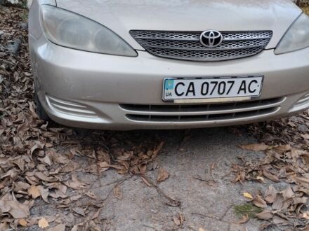 Бежевий Тойота Камрі, об'ємом двигуна 2.4 л та пробігом 290 тис. км за 5800 $, фото 1 на Automoto.ua