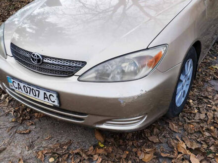 Бежевый Тойота Камри, объемом двигателя 2.4 л и пробегом 290 тыс. км за 5800 $, фото 1 на Automoto.ua