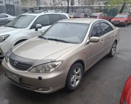 Бежевый Тойота Камри, объемом двигателя 2.4 л и пробегом 250 тыс. км за 8900 $, фото 1 на Automoto.ua