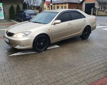 Бежевый Тойота Камри, объемом двигателя 2.36 л и пробегом 280 тыс. км за 6000 $, фото 1 на Automoto.ua