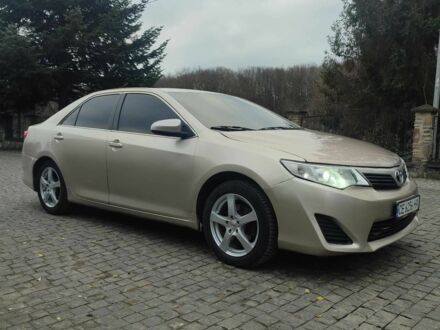 Бежевый Тойота Камри, объемом двигателя 2.5 л и пробегом 250 тыс. км за 11800 $, фото 1 на Automoto.ua