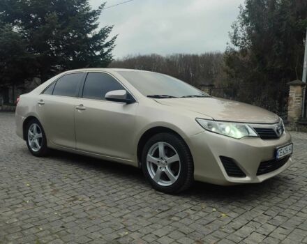 Бежевый Тойота Камри, объемом двигателя 2.5 л и пробегом 250 тыс. км за 11800 $, фото 1 на Automoto.ua