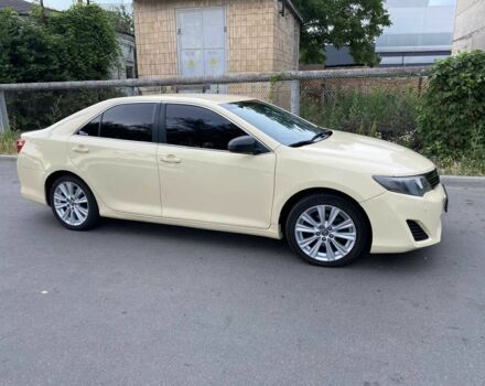 Бежевий Тойота Камрі, об'ємом двигуна 2.49 л та пробігом 236 тис. км за 8999 $, фото 1 на Automoto.ua