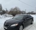 Черный Тойота Камри, объемом двигателя 2.4 л и пробегом 400 тыс. км за 4800 $, фото 1 на Automoto.ua