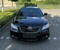 Чорний Тойота Камрі, об'ємом двигуна 2.4 л та пробігом 158 тис. км за 8999 $, фото 1 на Automoto.ua