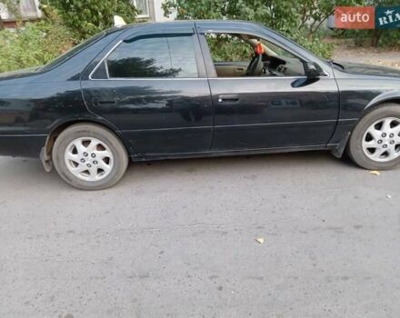 Черный Тойота Камри, объемом двигателя 2.2 л и пробегом 350 тыс. км за 3000 $, фото 5 на Automoto.ua