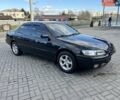 Черный Тойота Камри, объемом двигателя 2.2 л и пробегом 340 тыс. км за 4300 $, фото 1 на Automoto.ua