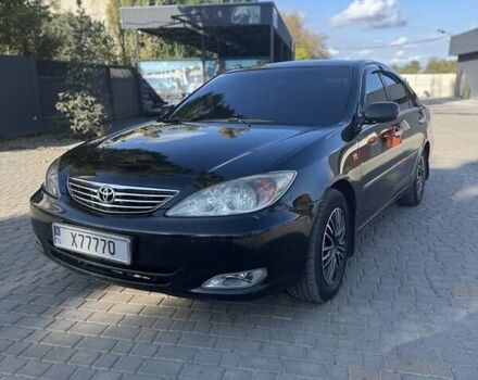 Черный Тойота Камри, объемом двигателя 2.4 л и пробегом 350 тыс. км за 6800 $, фото 7 на Automoto.ua