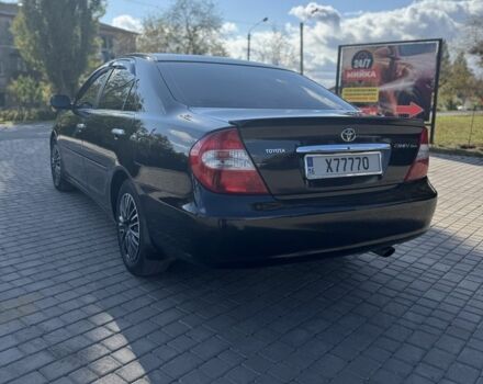 Черный Тойота Камри, объемом двигателя 2.4 л и пробегом 350 тыс. км за 6800 $, фото 7 на Automoto.ua