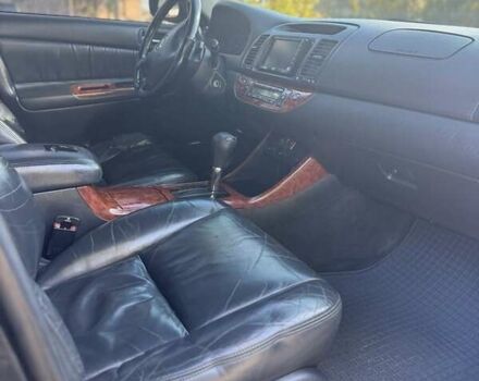Черный Тойота Камри, объемом двигателя 2.4 л и пробегом 350 тыс. км за 6800 $, фото 2 на Automoto.ua