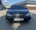 Черный Тойота Камри, объемом двигателя 2.4 л и пробегом 350 тыс. км за 6800 $, фото 1 на Automoto.ua