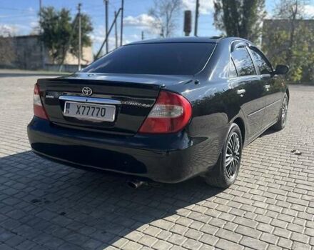 Черный Тойота Камри, объемом двигателя 2.4 л и пробегом 350 тыс. км за 6800 $, фото 5 на Automoto.ua