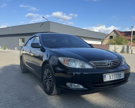 Черный Тойота Камри, объемом двигателя 2.4 л и пробегом 350 тыс. км за 6800 $, фото 2 на Automoto.ua