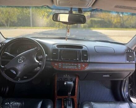 Черный Тойота Камри, объемом двигателя 2.4 л и пробегом 350 тыс. км за 6800 $, фото 3 на Automoto.ua