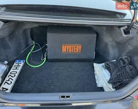 Черный Тойота Камри, объемом двигателя 2.4 л и пробегом 350 тыс. км за 6800 $, фото 4 на Automoto.ua