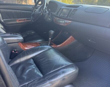 Черный Тойота Камри, объемом двигателя 2.4 л и пробегом 350 тыс. км за 6800 $, фото 3 на Automoto.ua