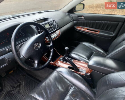 Чорний Тойота Камрі, об'ємом двигуна 2.4 л та пробігом 201 тис. км за 6999 $, фото 16 на Automoto.ua