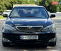 Черный Тойота Камри, объемом двигателя 3 л и пробегом 320 тыс. км за 5100 $, фото 1 на Automoto.ua