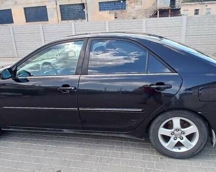 Чорний Тойота Камрі, об'ємом двигуна 2.4 л та пробігом 300 тис. км за 5200 $, фото 3 на Automoto.ua