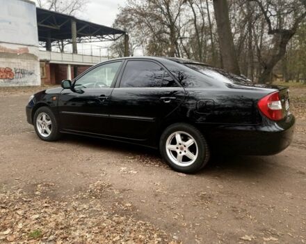 Чорний Тойота Камрі, об'ємом двигуна 2.4 л та пробігом 201 тис. км за 6999 $, фото 11 на Automoto.ua