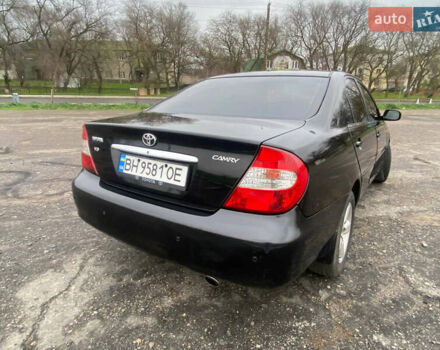 Черный Тойота Камри, объемом двигателя 3 л и пробегом 325 тыс. км за 6000 $, фото 6 на Automoto.ua