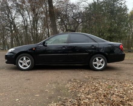 Чорний Тойота Камрі, об'ємом двигуна 2.4 л та пробігом 201 тис. км за 6999 $, фото 12 на Automoto.ua