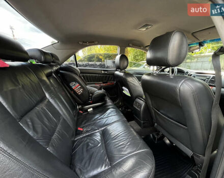 Черный Тойота Камри, объемом двигателя 3 л и пробегом 320 тыс. км за 5100 $, фото 5 на Automoto.ua