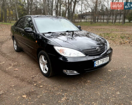 Чорний Тойота Камрі, об'ємом двигуна 2.4 л та пробігом 201 тис. км за 6999 $, фото 3 на Automoto.ua