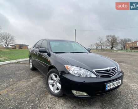 Черный Тойота Камри, объемом двигателя 3 л и пробегом 325 тыс. км за 6000 $, фото 4 на Automoto.ua