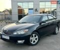 Чорний Тойота Камрі, об'ємом двигуна 2.4 л та пробігом 276 тис. км за 5300 $, фото 1 на Automoto.ua