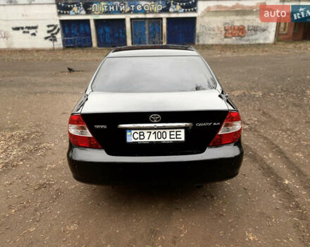 Чорний Тойота Камрі, об'ємом двигуна 2.4 л та пробігом 201 тис. км за 6999 $, фото 8 на Automoto.ua