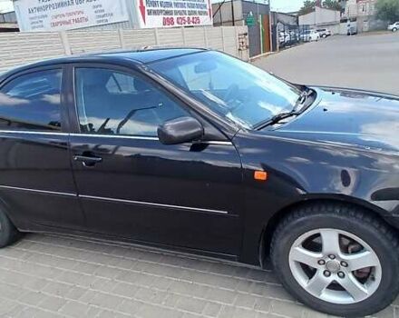 Чорний Тойота Камрі, об'ємом двигуна 2.4 л та пробігом 300 тис. км за 5200 $, фото 2 на Automoto.ua