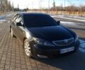 Черный Тойота Камри, объемом двигателя 2.36 л и пробегом 500 тыс. км за 4200 $, фото 1 на Automoto.ua
