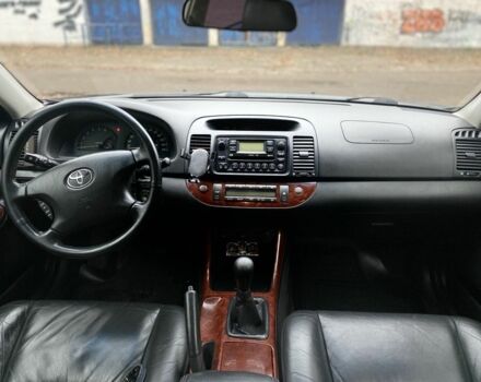 Чорний Тойота Камрі, об'ємом двигуна 2.4 л та пробігом 201 тис. км за 6999 $, фото 21 на Automoto.ua