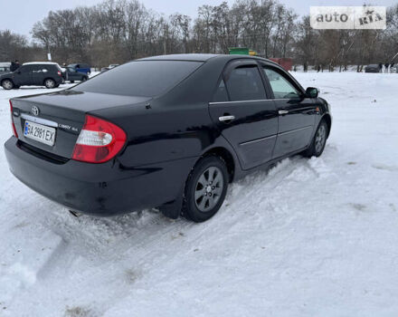 Черный Тойота Камри, объемом двигателя 2.36 л и пробегом 489 тыс. км за 5400 $, фото 4 на Automoto.ua