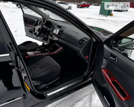 Черный Тойота Камри, объемом двигателя 2.36 л и пробегом 489 тыс. км за 5400 $, фото 7 на Automoto.ua