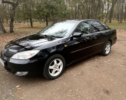 Чорний Тойота Камрі, об'ємом двигуна 2.4 л та пробігом 201 тис. км за 6999 $, фото 13 на Automoto.ua