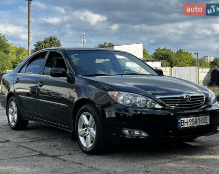 Черный Тойота Камри, объемом двигателя 3 л и пробегом 320 тыс. км за 5100 $, фото 1 на Automoto.ua