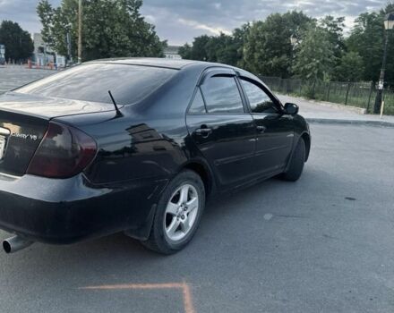 Чорний Тойота Камрі, об'ємом двигуна 3 л та пробігом 330 тис. км за 4400 $, фото 4 на Automoto.ua
