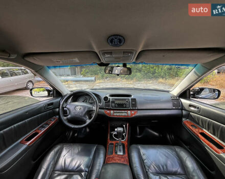 Черный Тойота Камри, объемом двигателя 3 л и пробегом 320 тыс. км за 5100 $, фото 4 на Automoto.ua